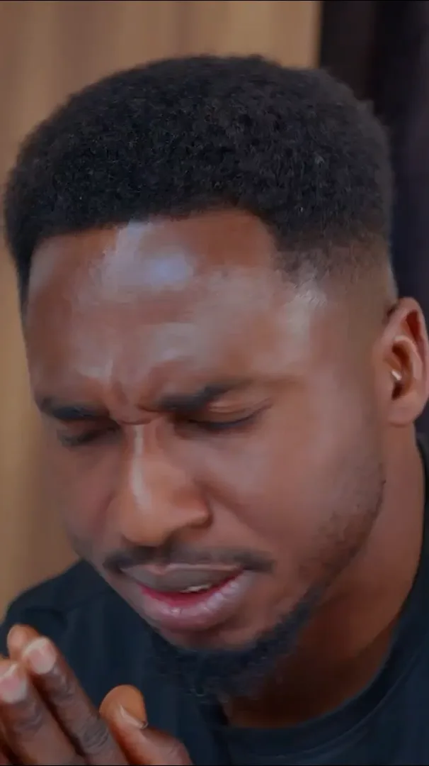 John Great in a moment of prayer from the Yahweh video